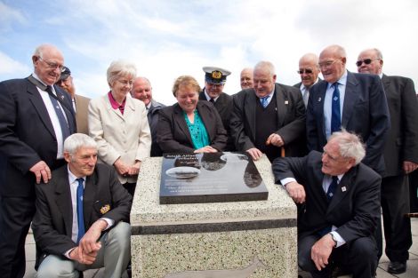 Recording the history of the whaling industry – members of the Shetland ex-Whalers Association, from left to right: Geordie Robertson, Davie Cooper, Gibbie Fraser (chairman), Laurena Fraser, Tony Jarmson, Pat Christie, Aubrey Jamieson (Fishermen’s Mission), Alister Thomasaon, Mitchell Arthur, Jamie Smith, Willie Tait, Billy Craigie and John Winchester (vice-chairman) – Photo: Shetland News