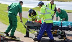 Crewman from oil standby vessel Enea being stretchered to GBH. Pic. Craig Sim