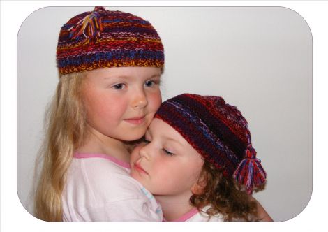 Eve and Faith modelling Sheila's hats