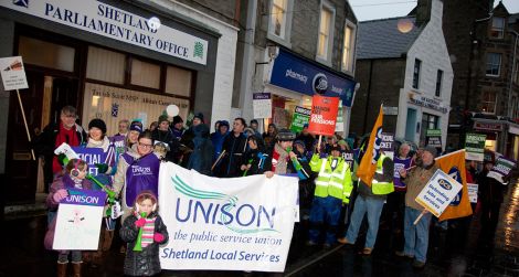 Union members march through Commercial Street on Wednesday morning - all photos: Billy Fox