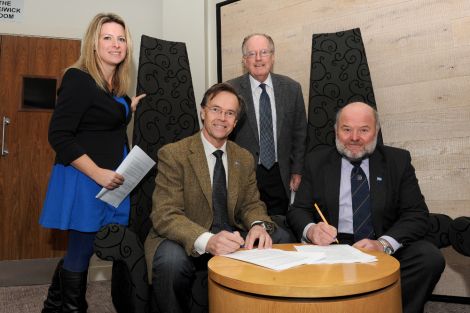 Signing of the memorandum of understanding between Vattenfall, Shetland Islands Council and Shetland Charitable Trust. From Left to right : Katrina Wiseman HIE, Veijo Huusko Vattenfall, Bill Manson SCT and Alasdair Cooper SIC - Photo: Malcolm Younger/Millgaet Media/HIE