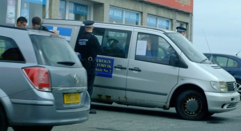 Stuart Hill being arrested in Lerwick on 5 July this year - Photos: Shetland News