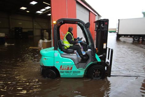 JBT transport company's warehouse at Gremista, Lerwick, was flooded by the overnight storm. Pic. David Paul