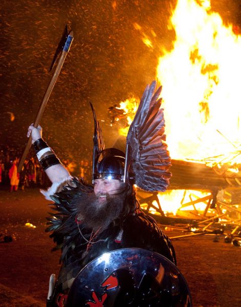 Guizer Jarl David Nicolson in front of his burning galley.