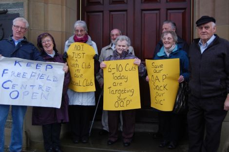 Pensionors protesting against the proposed closure of the Freefield Centre outside Lerwick town hall on the day of budget cuts, last month - Photo: Pete Bevington