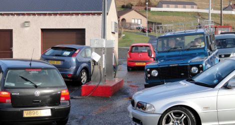 Cars queuing outside Tagon Stores on Saturday afternoon.