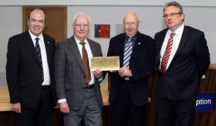 Celebrating the opening of the new council headquarters are (from left to right): Shetland Charitable Trust financial controller Jeff Goddard, SLAP chairman Jim Henry, the council's political leader Josie Simpson, and SIC chief executive Alistair Buchan - Photo: Millgaet Media