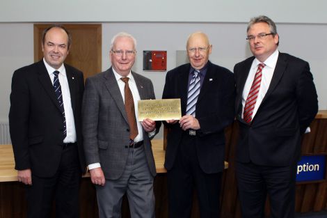 Celebrating the opening of the new council headquarters are (from left to right): Shetland Charitable Trust financial controller Jeff Goddard, SLAP chairman Jim Henry, the council's political leader Josie Simpson, and SIC chief executive Alistair Buchan - Photo: Millgaet Media