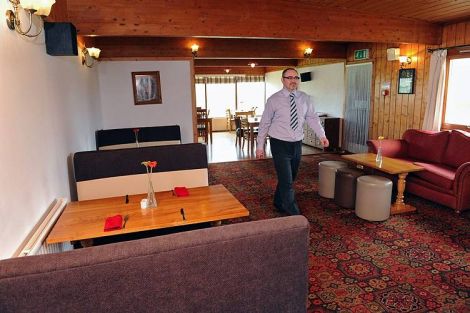 Steven Swan in the refurbished Baltasound Hotel - Photo: Malcolm Younger for HIE