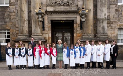 Standing at the right of the group with Camilla, Duchess of Cornwall, at Edinburgh's Holyroodhouse palace are (from right) Moira Dobson, Sianlee Lawson, James Spall, Danielle Johnson and Craig Manson. Pic. Peter Adamson