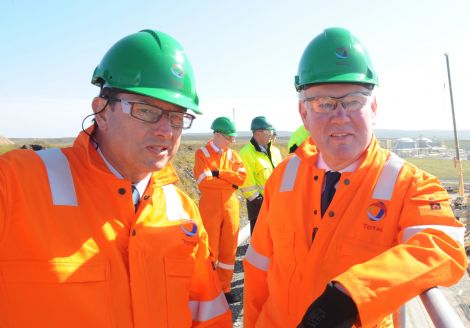 UK energy minister Charles Hendry (right) being shown around the Total gas plant construction site by the company's managing director Philippe Guys. Pic. Malcolm Younger