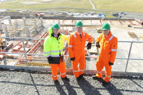 Total's senior vice president Patrice de Vivies (left) joins Mr Hendry and M Guys during Wednesday's tour. Pic. Malcolm Younger