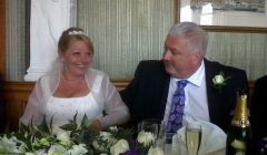 Former SIC chief executive Dave Clark and his wife Judith on their wedding day in April