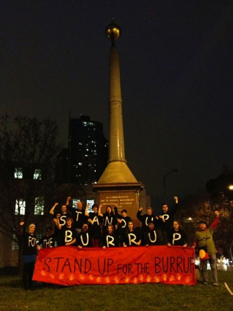 Davie Thomason (right) stands up for Mother Earth with friends in Melbourne