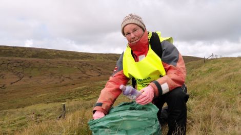 66 year old Cecilia James begins her marathon redd up. Pic. Shetland News