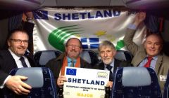 'We won!' The Shetland delegation celebrate receiving the European Community of Sport 2013 award. From left: SIC leader Gary Robinson, leisure centre architect Allan White, SRT chairman Joe Irvine & SRT general manager James Johnston. Pic. SRT