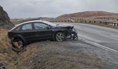 This car was badly damaged when it came off an icy stretch of road north of Voxter on the B9076 near Brae on Friday morning. Pic. Ivan Hawick