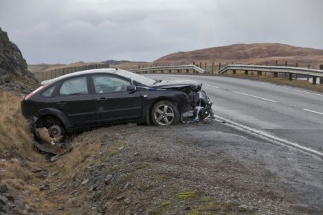 This car was badly damaged when it came off an icy stretch of road north of Voxter on the B9076 near Brae on Friday morning. Pic. Ivan Hawick