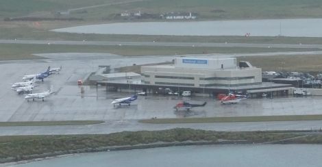 Sumburgh airport in November with fixed wing and rotary aircraft lining up to handle the growing oil-related passenger traffic.