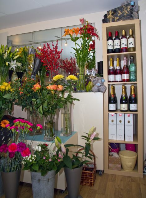 Fresh flowers and wine both benefit from the new lighting