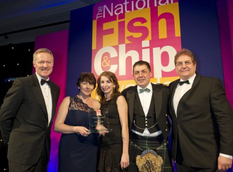 Didn't they do well! Frankie's owner Valerie Johnson, her daughter Carlyn Kearney and manager John Gold 'pleasantly surprised' after scooping four awards for their fish and chips, flanked by host Rory Bremner and award sponsor Philip Blakeman. Pic. Seafish