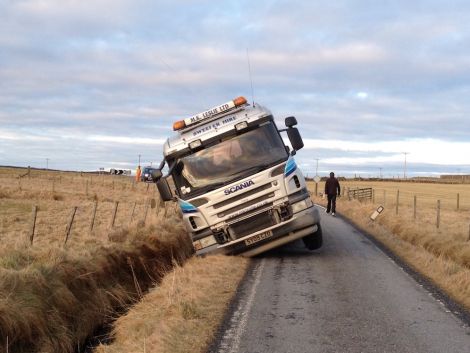 The road sweeper blocks the Tingwall valley road on Sunday afternoon. Photo SN