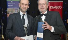 Company partner Pete Bevington (left) received the award from Scottish Government secretray for education and lifelong learning Mike Russell - Photo Ewen Weatherspoon