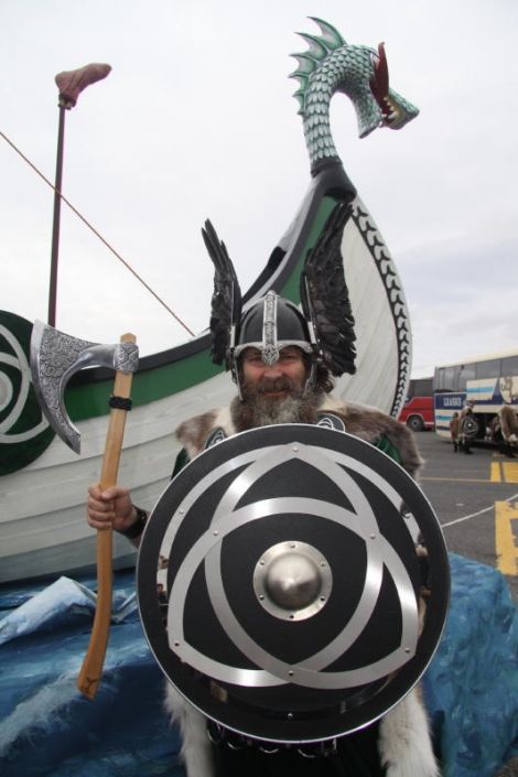 SMUHA guizer jarl Rognvald Eysteinsson, aka Dale Smith, with his galley Sunnanhamar. Photo Davie Gardner