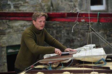 Douglas Henshall gives his wee boat a scrape as he figures out who killed who in 'Shetland'. Photo BBC