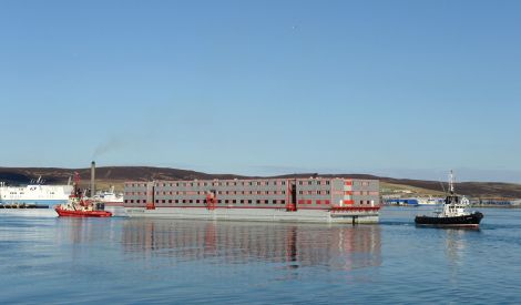 Accommodation barge Bibby Stockholm being towed into Lerwick harbour on Tuesday morning where she is being tied up at MOrrison Dock. Photo Malcolm Younger/Millgaet Media