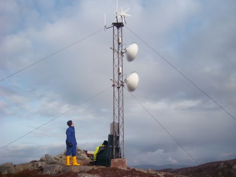 Connected! The mast with its turbine and dishes on top of Engamoor at West Burrfirth - Photo: Shetland Broadband