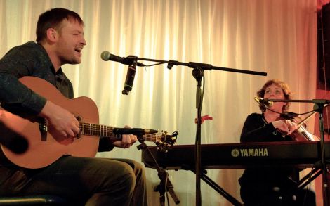 Orkney's Brian Cromarty sings his heart out with local lass Jenny Keldie on fiddle. Photo Olivia Abbott