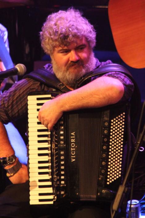 Local accordionist Peter Woods waits his turn. Can't you tell he's loving it? Photo Davie Gardner