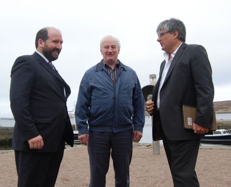 NYDC's Colin Dickie (left) and Robert Henderson show their delight with their grid connection upon meeting SSE chief executive Ian Marchant on Tuesday afternoon. Photo Shetland News