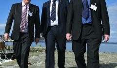 Island council leaders Angus Campbell, Gary Robinson and Steven Heddle in Lerwick on a sunny day in May this year. Photo Malcolm Younger