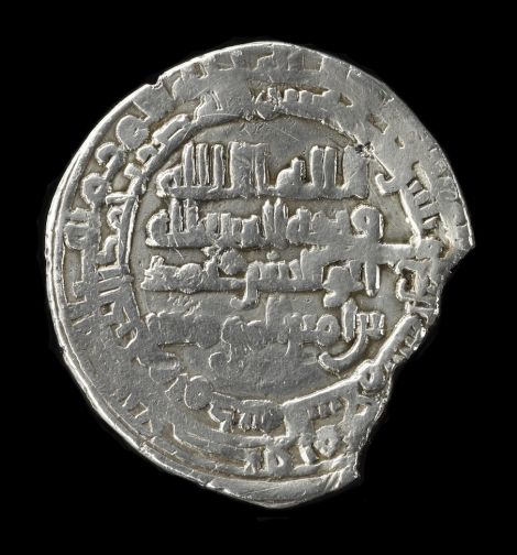 Silver dirham of the time of Al-Mustakfi as Imam al-Haqq, with Abu Hasan Muhammad; Arab (Abbasid), minted at Baghdad (945-6), found at Skaill. Photo National Museums Scotland