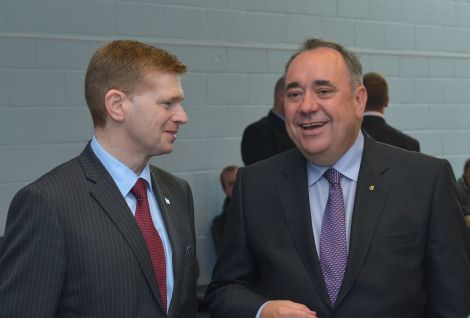 SIC convener Malcolm Bell welcomes the First Minister at Sumburgh airport.