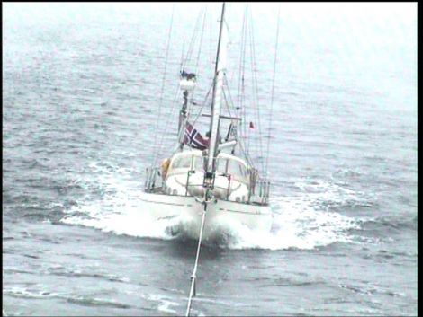 The yacht Exodus being towed into Scalloway harbour by the Aith lifeboat. Photo RNLI