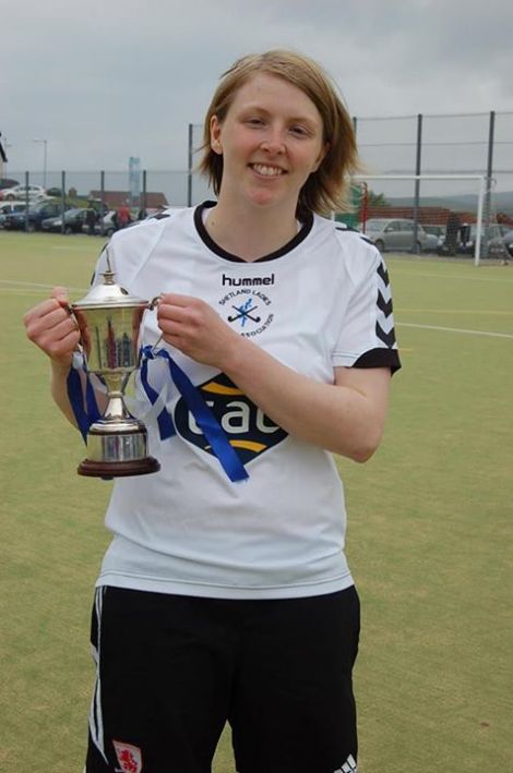 Shetland captain Toni Sudgwick earned the player of the match trophy for her sterling performance keeping the Orkney goal sheet so low. player of the match