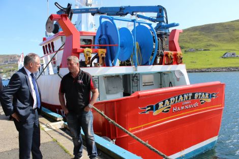 Scottish fishing minister Richard Lochhead discussing the forthcoming discards ban with skipper of the Radiant Star and current chairman of the Shetland PO Victor Laurenson - Photo: Hans J Marter/ShetNews