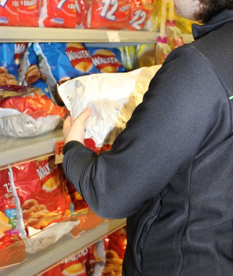 This young man found work at a local supermarket through the project. Photo Moving On