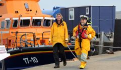 Lerwick lifeboat coxswain Bruce Leask welcomes Carol Smithard to the station - Photo: Malcolm Younger/Millgaet Media