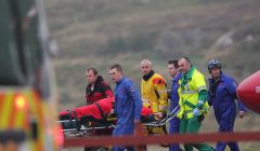 One casualty was taken on a stretcher to a waiting ambulance - Photo: Garry Sandison