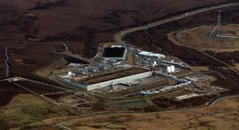 An aerial view of the Shetland Gas Plant as it takes shape, with the two large peat stores clearly visible.