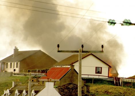 The garage was well alight when fire crews were called to the blaze - Photos: ShetNews