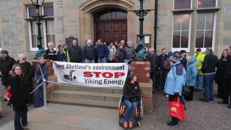 Anti-Viking Energy campaigners protest outside Lerwick Town Hall in December 2010 before councillors decided not to object to the wind farm. Photo ShetNews