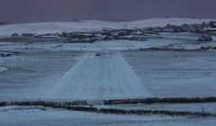 A snow covered Sumburgh airport which struggled to return to normal on Friday. Photo Ronnie Robertson