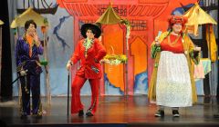 Aladdin (Hilary Smith), Wishy Washy (Lynsey Rendall) and Widow Twankey (Bob Lowes) share some laughs - Photo: Millgaet Media.