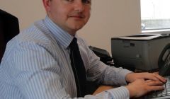 SIC finance executive manager James Gray