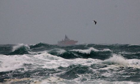 A standby vessel braving stormy seas on Sunday. Photo: Ian Leask